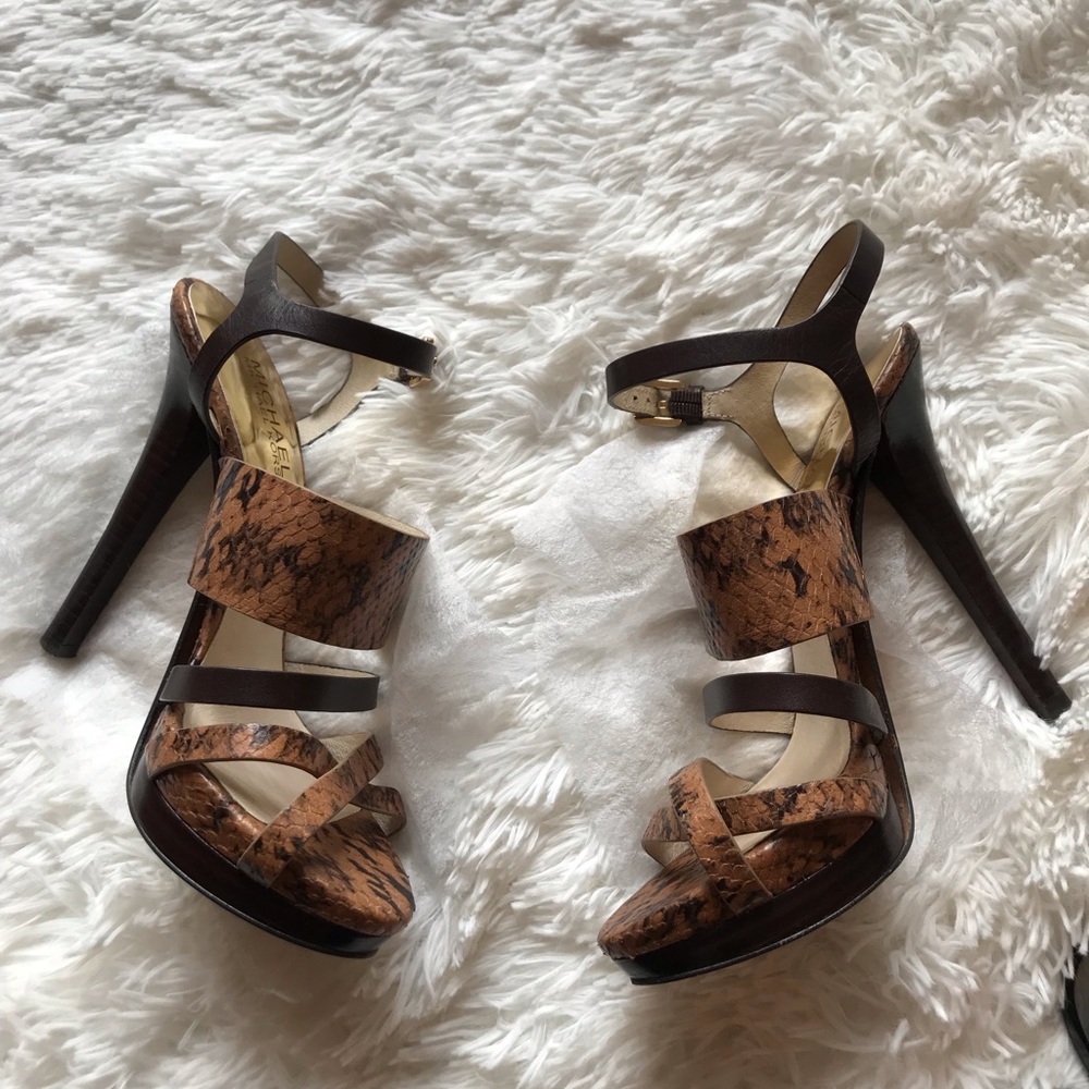 MK animal print leather sandals.